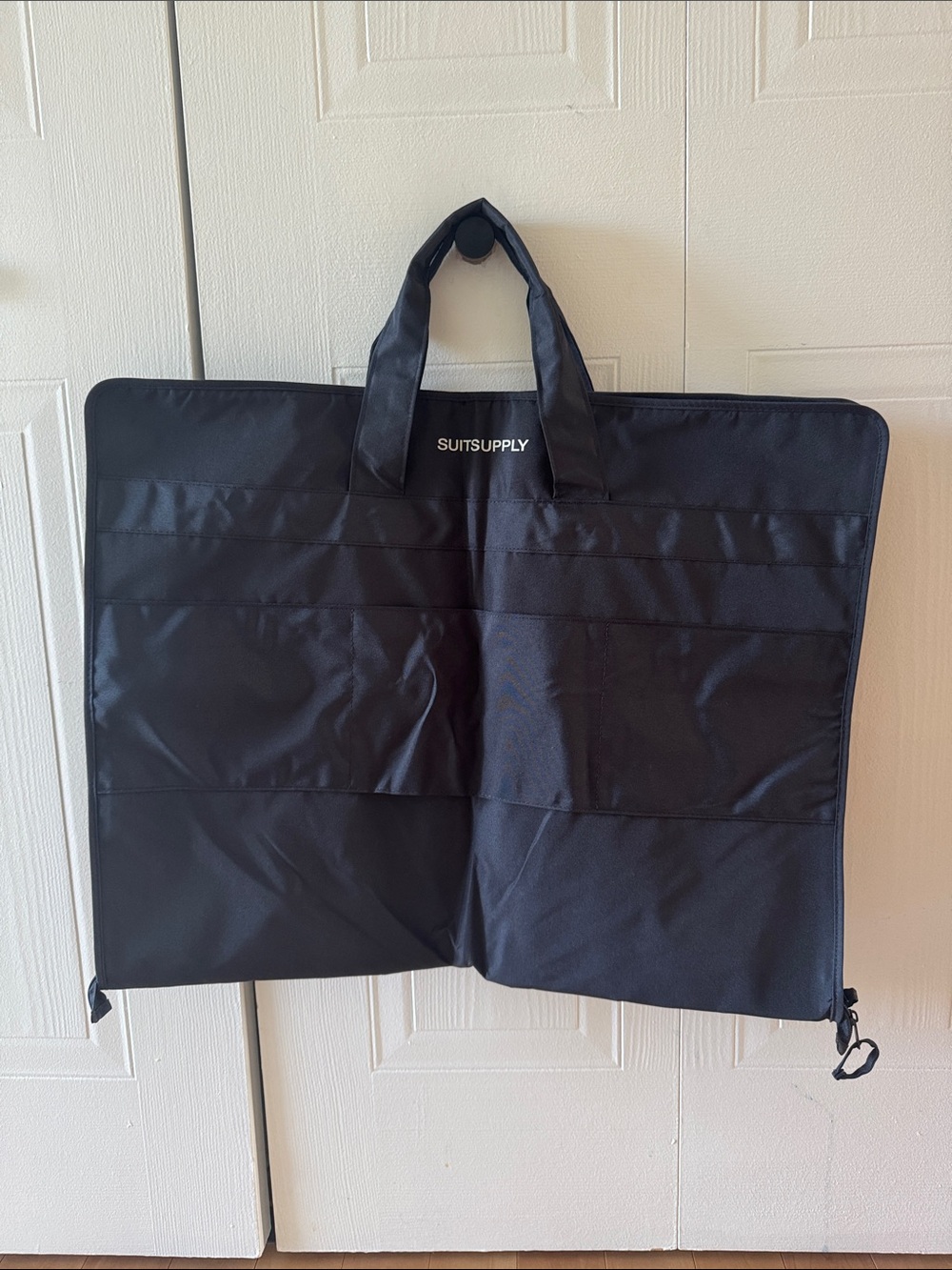 Suitsupply dark navy garment bag